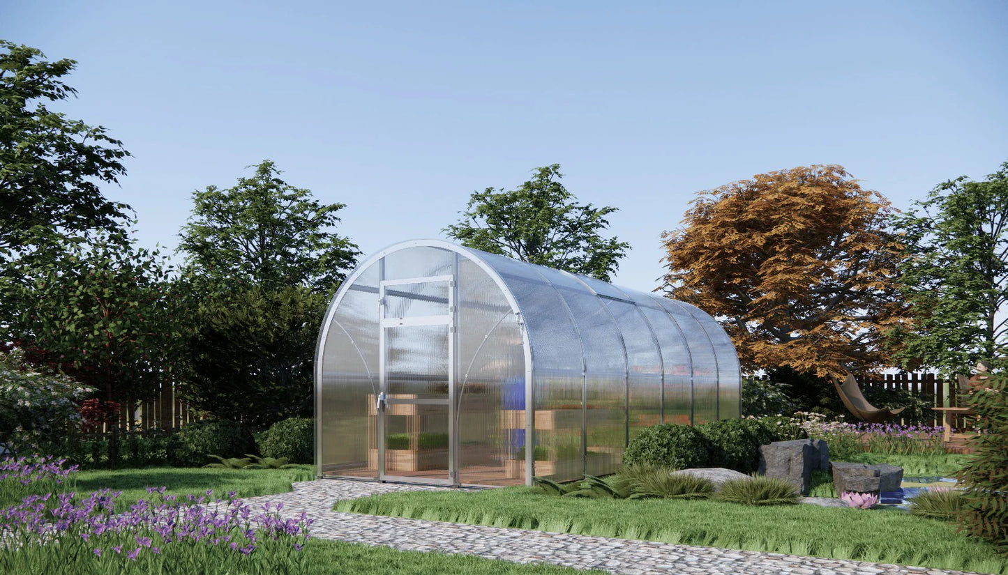 Sigma 250 (Gen III) Greenhouse in a garden with trees and flowers - Planta Greenhouses EU.