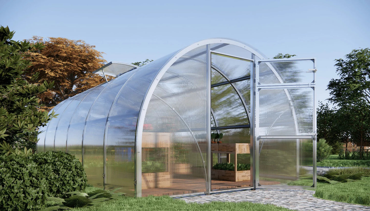Clear polycarbonate Sigma 3x10 (Gen III) greenhouse with glass doors in a garden setting - Planta Greenhouses EU.