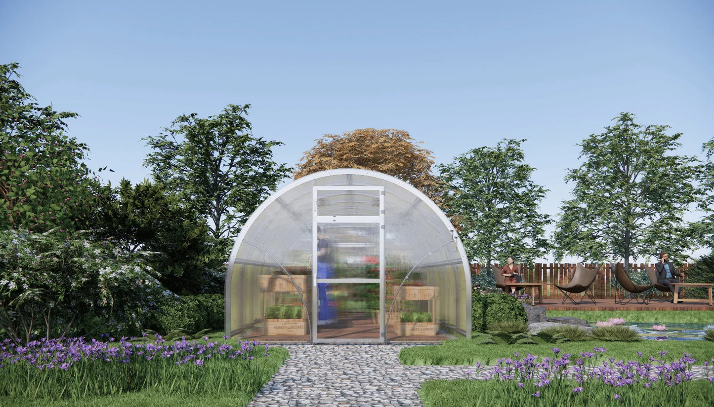 Modern Sigma 300 (Gen III) greenhouse in a garden with trees and flowers
