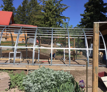 Extends the Growing Season and Keeps Our Chickens Warm in Winter!