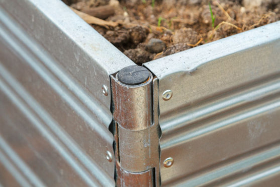 A closeup of a corner of a Planta Garden Bed - 2 Tiers - Planta Greenhouses